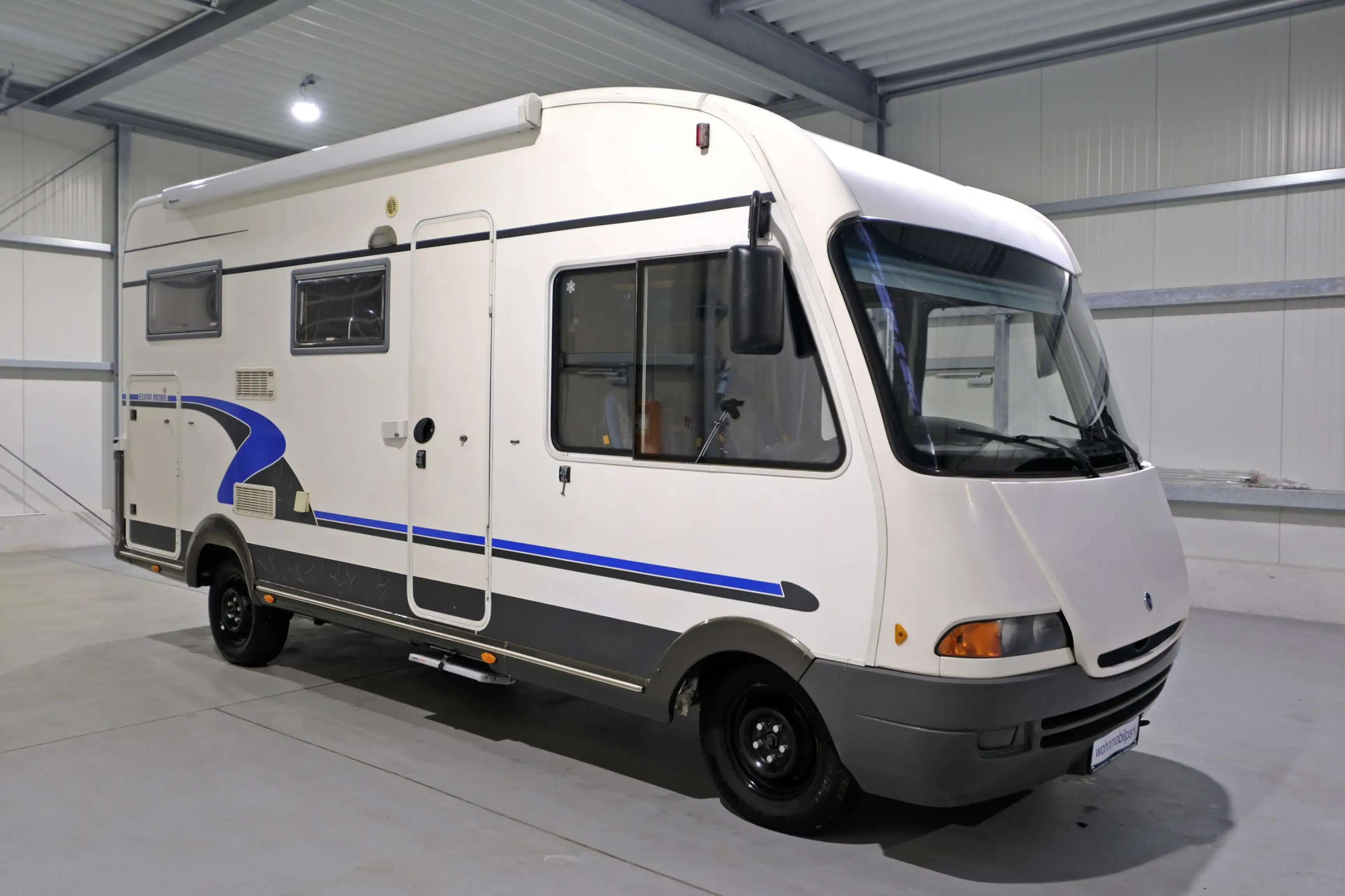 EURAMOBIL Integra 660 HB/Festbett+Hubbett/Garage/Klimaanlage/Solaranlage/Markise/AHK/dop.Boden/Finanzierung möglich